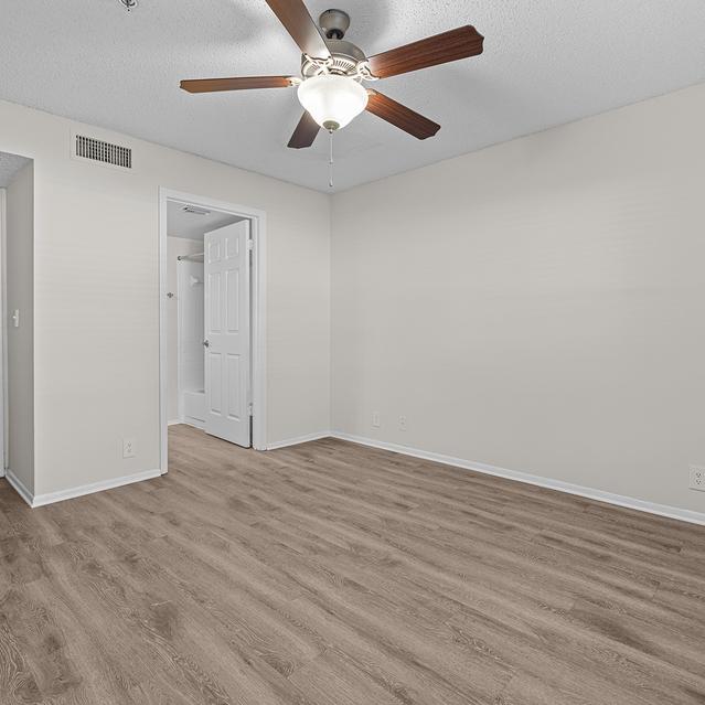 The Park at Veneto - Spacious Empty Room with Light Wood Flooring