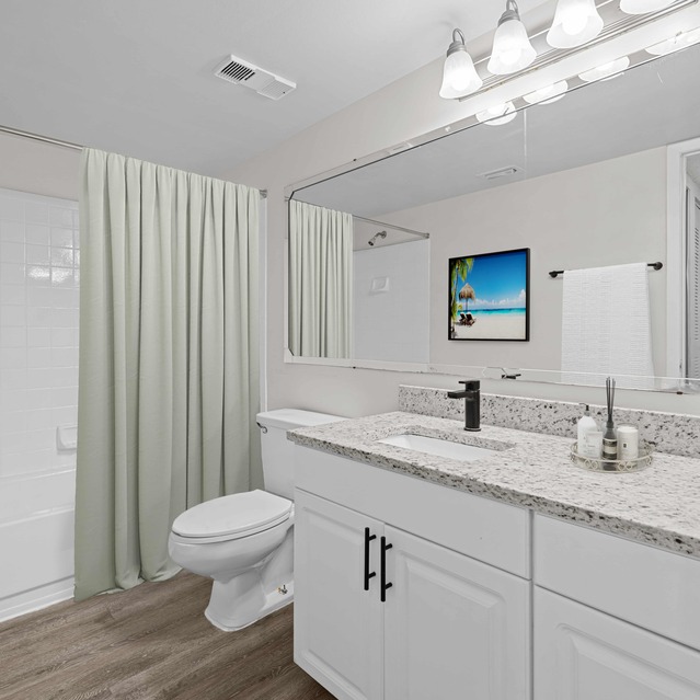 The Park at Veneto - Modern Bathroom Featuring a Granite Countertop